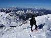 Jürgen am Gipfel der Lungauer Kalkspitze mit dem Hochkönig im Hintergrund.